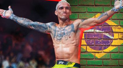 LAS VEGAS, NEVADA – MARCH 07: Charles Oliveira of Brazil strikes Max Holloway of the United Sta...