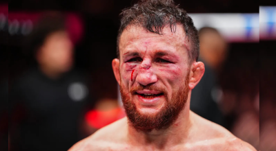 LAS VEGAS, NEVADA – DECEMBER 06: Petr Yan (R) punches Merab Dvalishvili of Georgia in a bantamw...